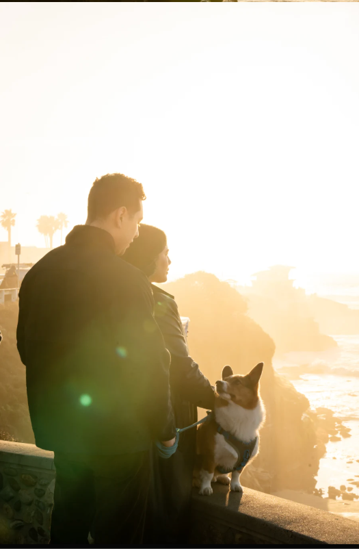 Sunshine and Fernando with their corgi at Sunset Cliffs